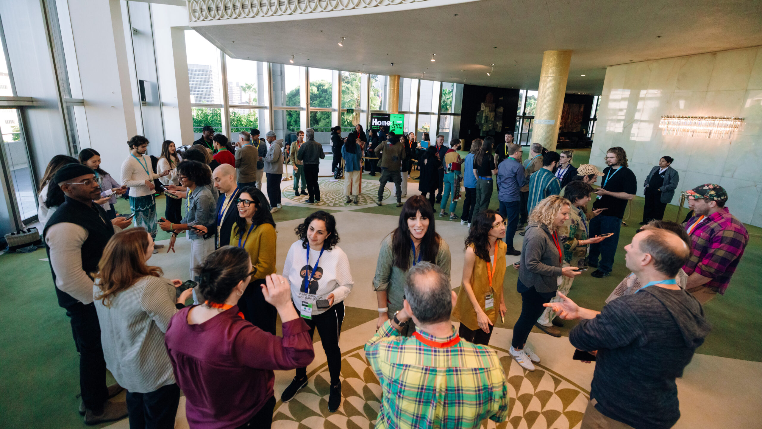 Participants converse in two concentric circles.