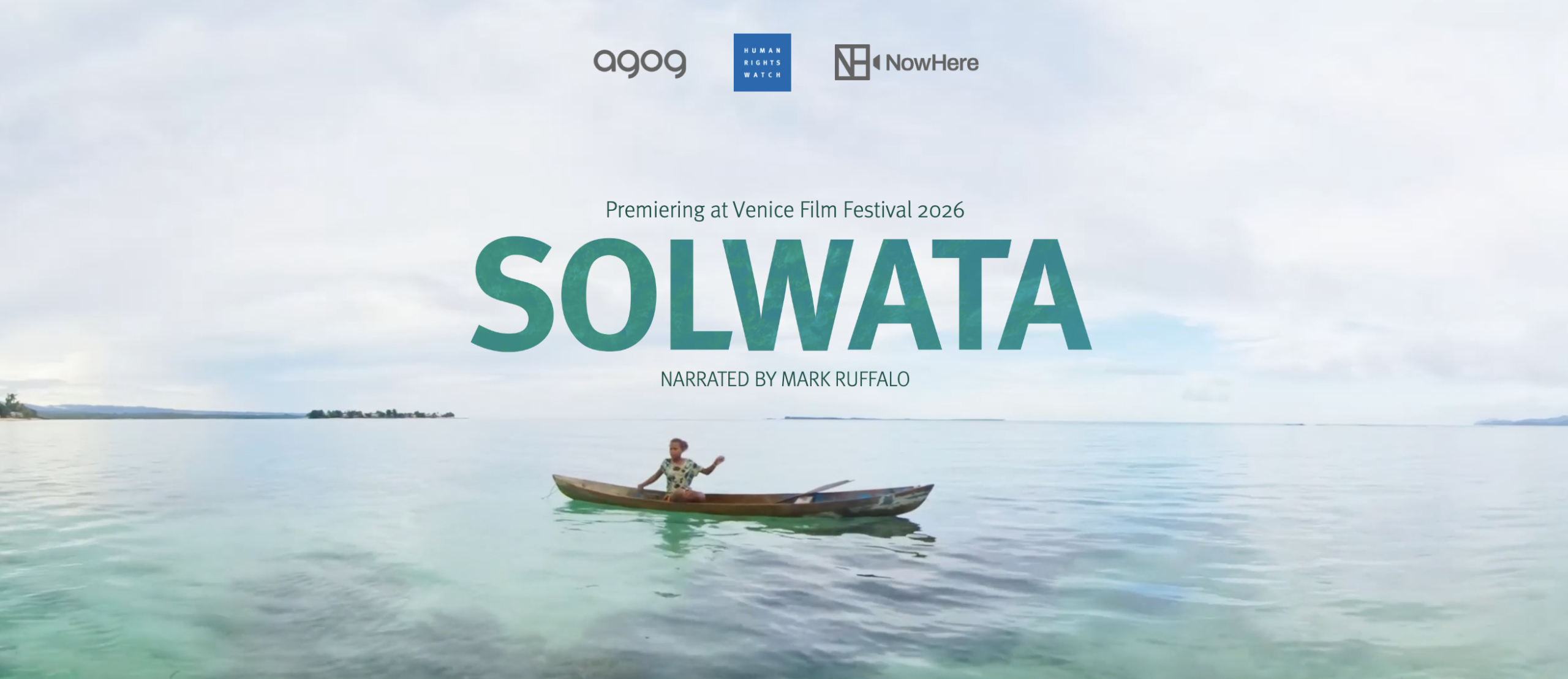Woman fishes in boat off Soloman Islands